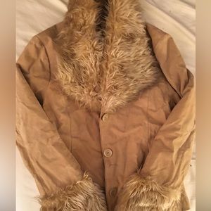 Static suede jacket with fur detail around collar and wristbands. Size medium.